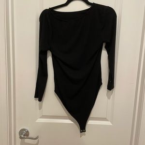 Simple, black bodysuit